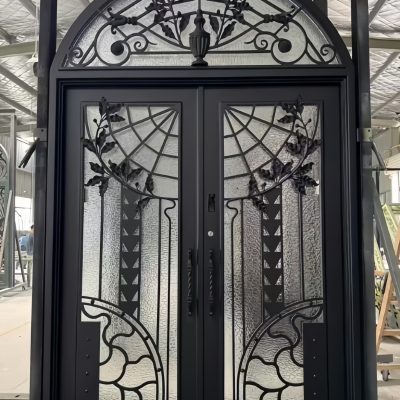 Custom European style wrought iron gate with ornate scrollwork and arched top – luxury villa entrance gate