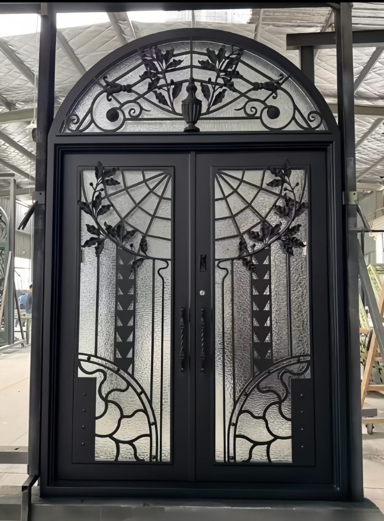 Custom European style wrought iron gate with ornate scrollwork and arched top – luxury villa entrance gate