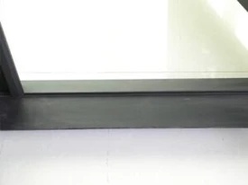 LIKE Metal wrought iron gate threshold featuring a sturdy steel base plate with weatherproof seal, anti-slip surface, and corrosion-resistant black powder coating, designed for secure floor mounting and seamless integration with custom entry gates and French doors for residential and commercial properties.